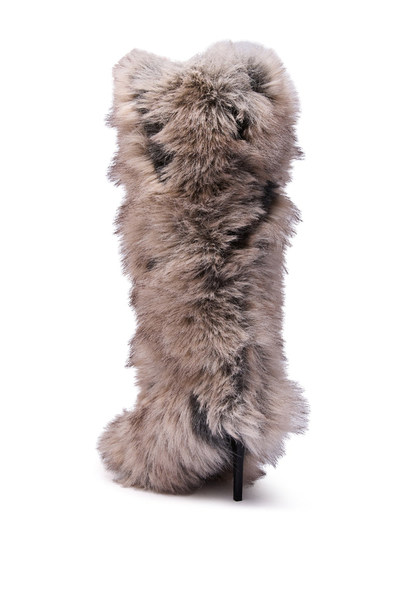 The AZALEA WANG DEBBY GREY MULTI FUR STILETTO BOOTIE is a knee-high boot with a pointed toe, fully covered in thick grey and brown faux fur, displayed against a white background.