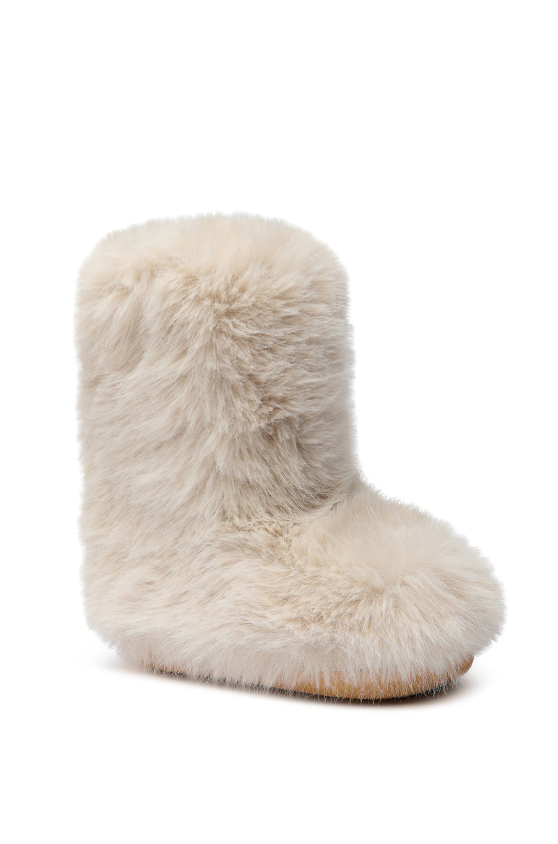 The AZALEA WANG DIPA IVORY FUR FLAT BOOTIE, featuring a fluffy texture and flatform sole, is showcased against a white background.
