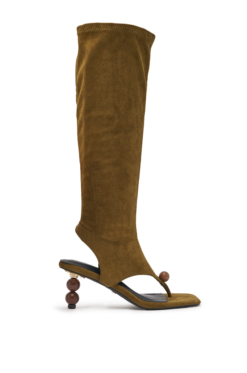 The AZALEA WANG DOTTIE Olive Stretch Faux Suede Boot features knee-high styling, an embellished heel and toe hardware, and a sleek look for standout appeal. 3
