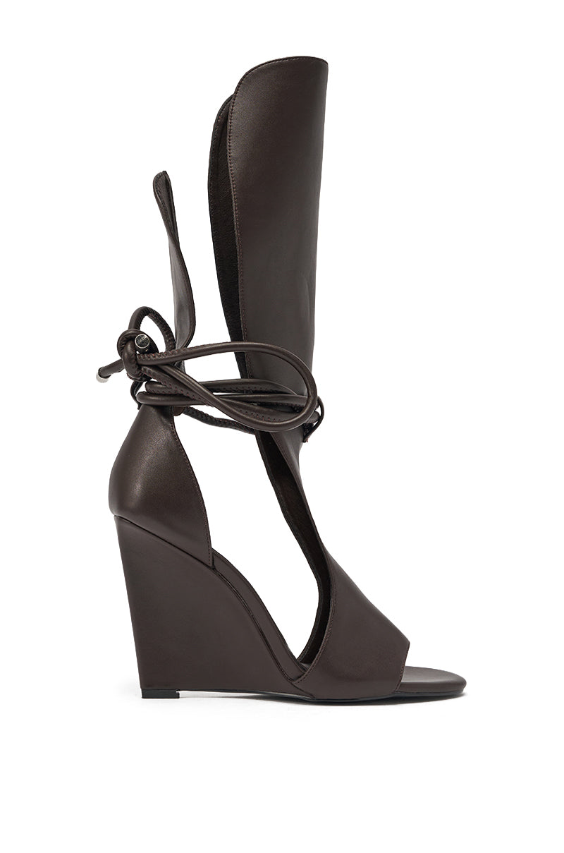 The AZALEA WANG DOUMA CHOCOLATE WEDGE LACE UP TALL SHAFT SANDAL features dark brown wrap-around laces, an open toe, high wedge heel, cutout sides, and an extended upper that ties stylishly at the ankle. 3