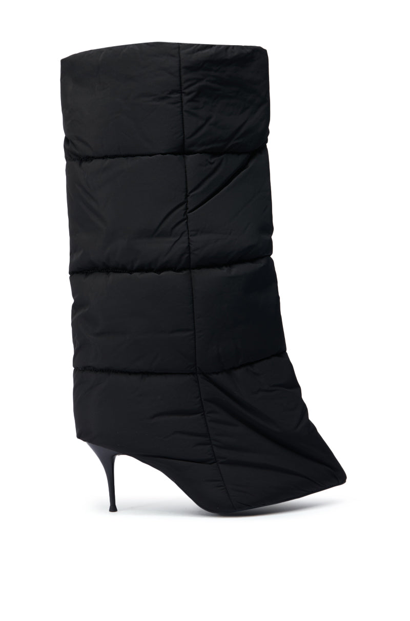 The DREAMSICLE BLACK PUFFER STILETTO BOOT features a striking black, quilted upper and a mid-calf shaft, highlighting its pointed toe against a white background.
