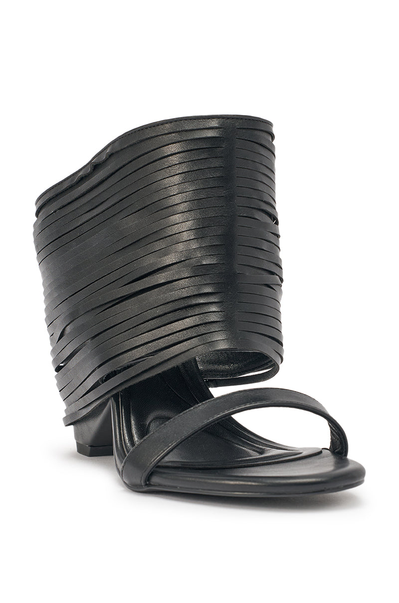 The AZALEA WANG DREIA BLACK PU FRINGE WEDGE SANDAL features a low wedge heel, unique layered wrap-around upper with horizontal leather strips, open toe design, and a comfort cushion insole for all-day wear. 4