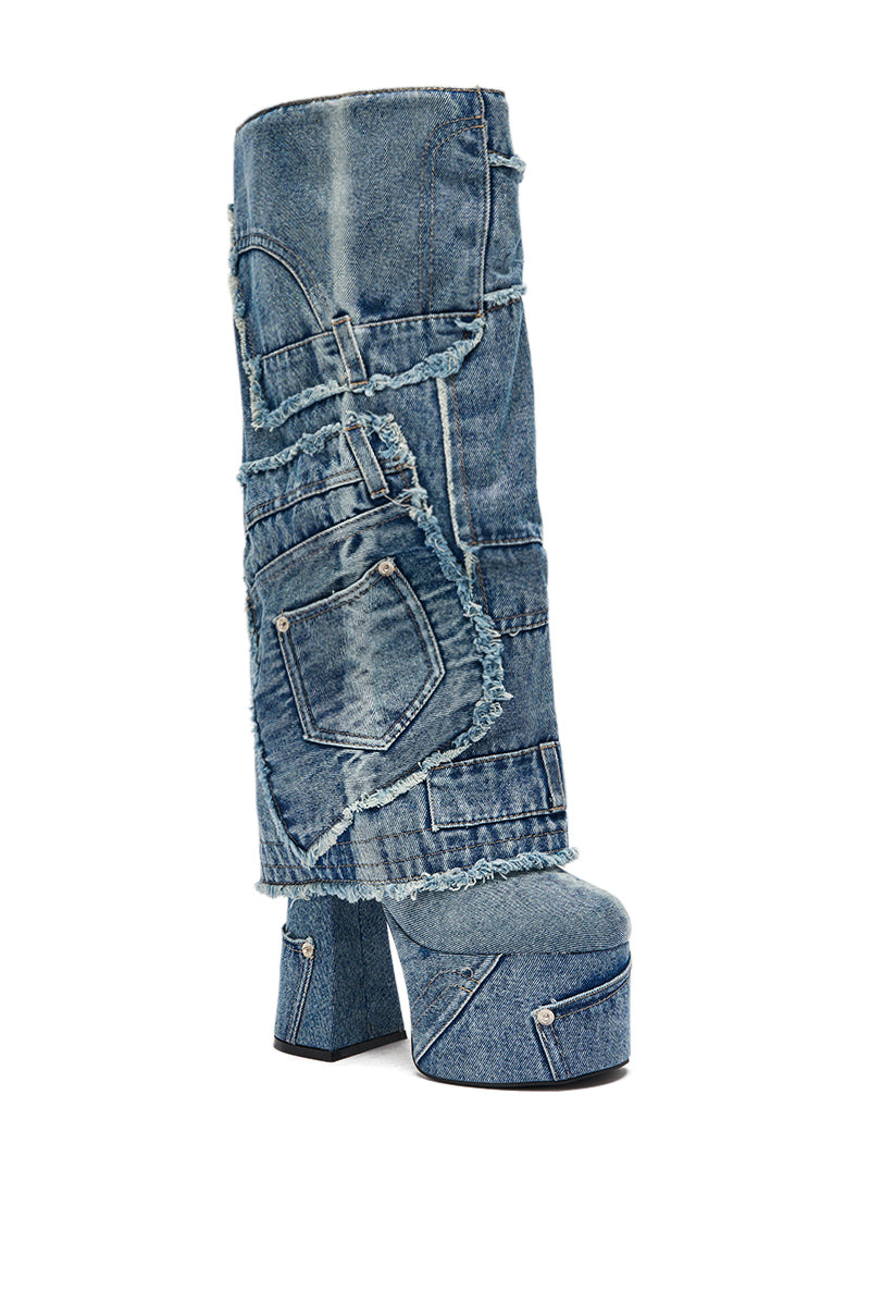 The AZALEA WANG DUMI DENIM CHUNKY PATCHWORK BOOT features a high platform, bold stitching, frayed edges, and decorative jean-style pockets—ideal for anyone wanting trendy denim boots. 6
