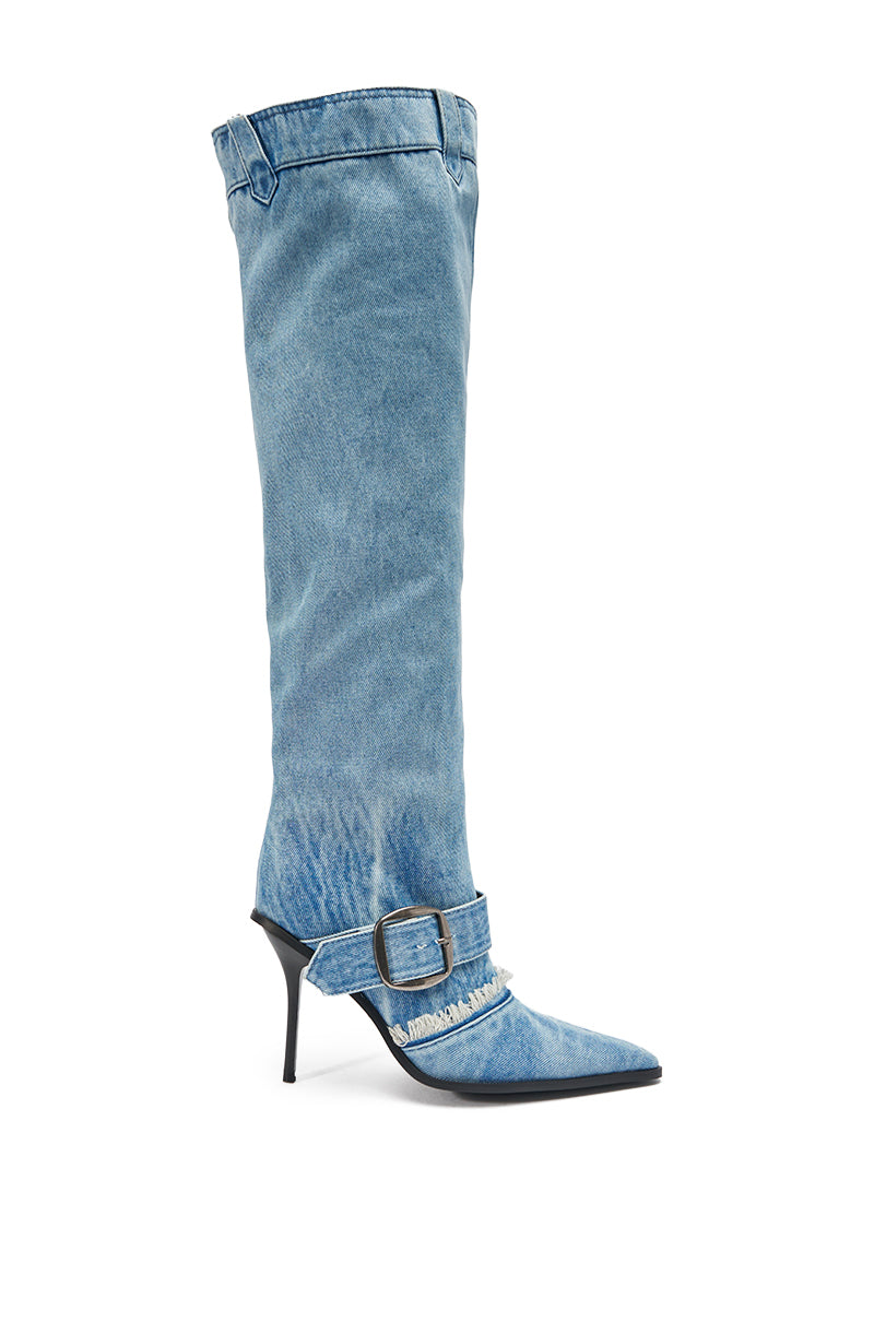 The AKIRA GOLD DURANGO DENIM STILETTO PANT LOOK BOOT is a high-heeled, pointed-toe denim boot with a bold ankle buckle strap, crafted to mimic jeans—a statement piece for unique denim lovers. 4