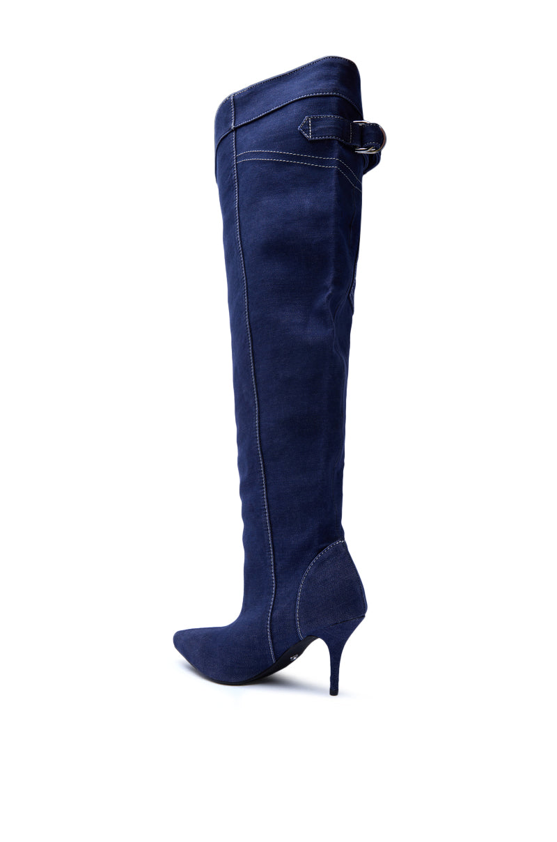 The AZALEA WANG DUSTAN DENIM THIGH STILETTO BOOT features dark wash denim, a pointed toe, decorative stitching, and a side buckle—ideal for those seeking knee-high boots with standout style. Displayed on a white background.