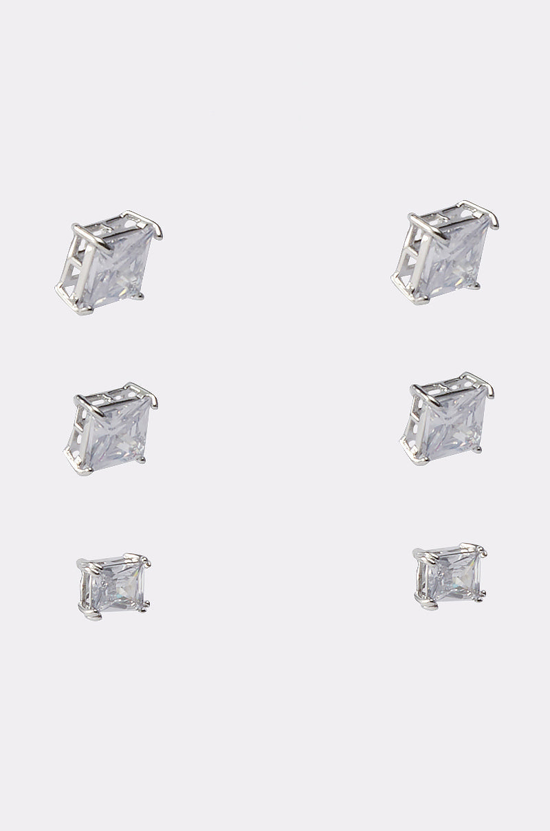 Three pairs of silver-tone stud earrings from the 3 PACK STUD EARRING set, each featuring square-cut cubic zirconia, are displayed in neat rows on a plain light background. 3