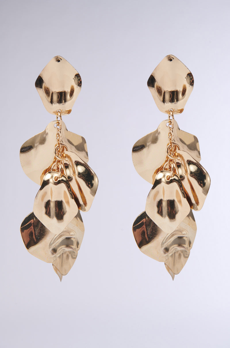 The NO THANKS EARRING is an abstract, textured pair featuring overlapping shiny petal-shaped metal pieces in a faux gold finish for a layered, dimensional look. 3