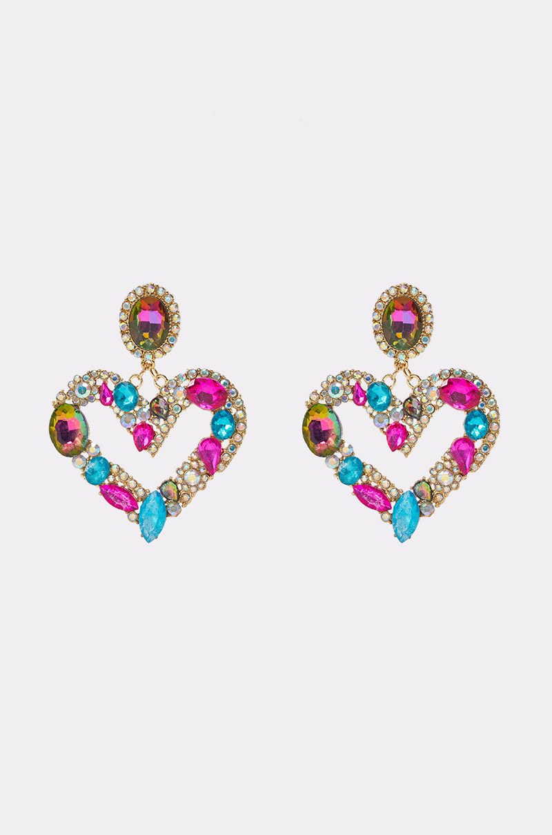 Introducing the FAB AF HEART EARRINGS: a dazzling pair of heart-shaped crystal drop earrings adorned with vibrant pink, blue, and gold gemstones. These gold-tone earrings feature round tops and intricate pave rhinestone detailing for extra sparkle.