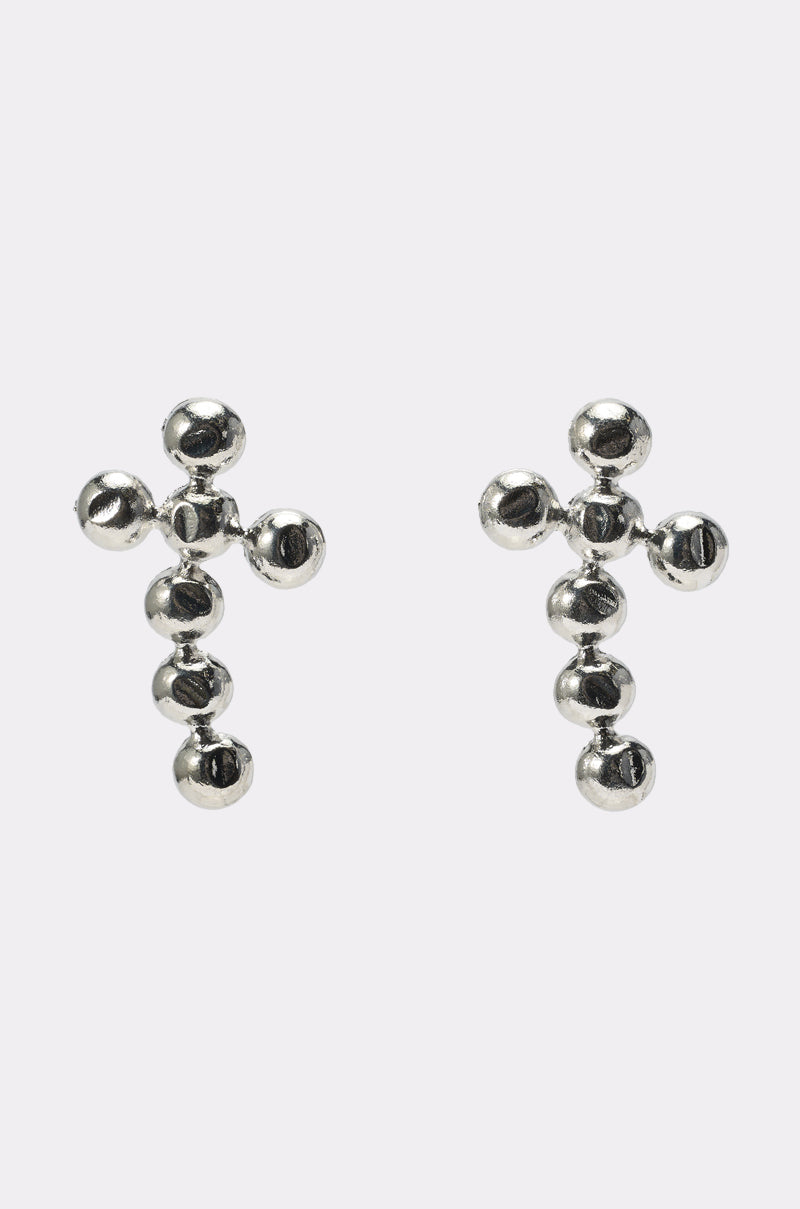 The PUNK VIBE EARRING features silver sculptural cross-shaped earrings crafted from small metallic spheres, shown on a plain light gray background—ideal for making a bold statement at parties. 0