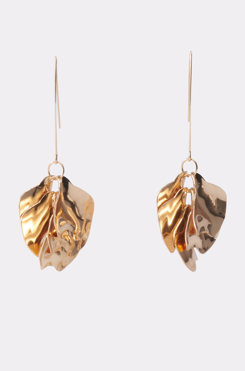 A pair of METALLIC MANIA EARRING gold dangle earrings, leaf-shaped with a hammered, crinkled texture, each hanging from a thin hook on a plain white background. 4