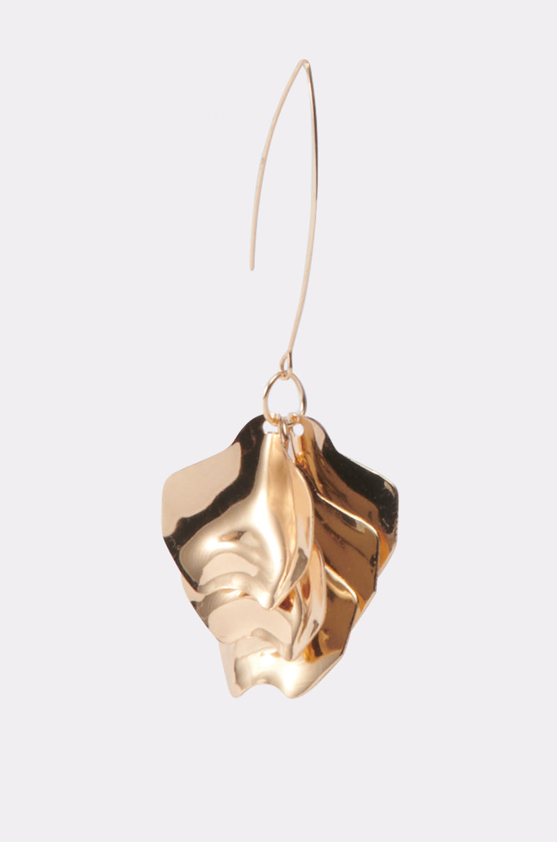 A single METALLIC MANIA EARRING in gold features an abstract, wavy, layered design with a crinkled texture and a thin, curved hook, displayed on a plain light gray background. 5