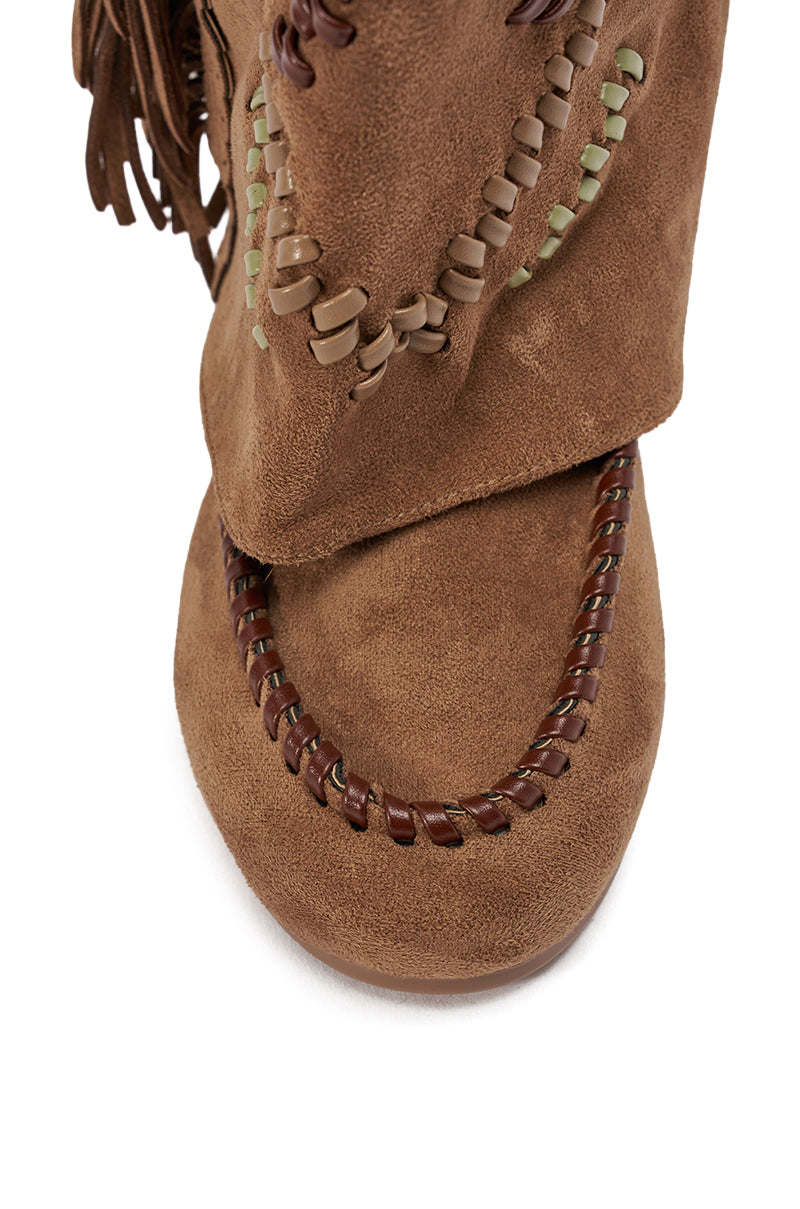 Close-up of the toe section of the AZALEA WANG EDMUND BROWN FLAT WESTERN BOOT in faux suede, with decorative stitching and woven seam details, featuring tan and green accents. 9