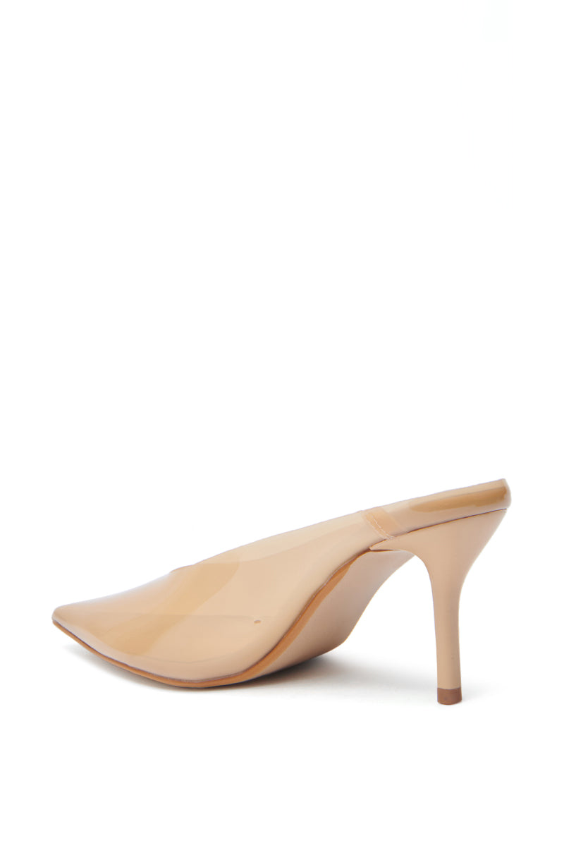 The AZALEA WANG EEMIL NUDE PUMP STILETTO is a nude, pointed-toe mule with a glossy finish and elegant stiletto heel, displayed in side profile on a white background for a chic, modern appeal.