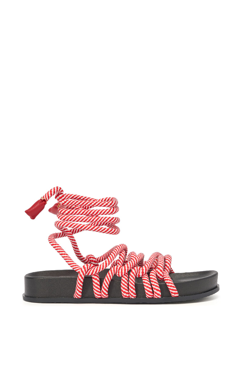 The AZALEA WANG EINER Red Rope Flatform Sandal features red and white twisted rope straps wrapping around the foot and ankle, a black open-toe design, and a flat sole—perfect for stylish summer wear. 4