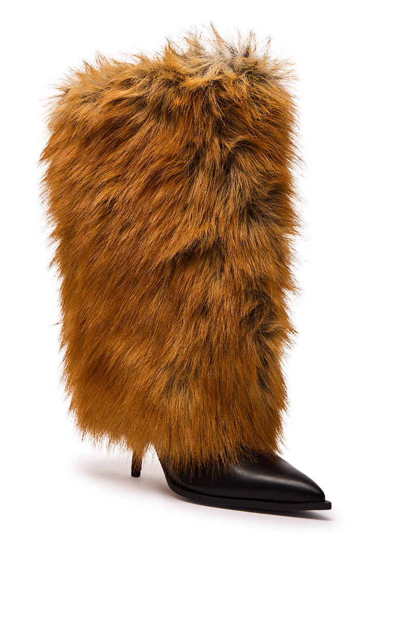 The AZALEA WANG EKKEN RED FOX FUR STILETTO BOOT features a black pointed toe, thick shaggy reddish-brown faux fur, and a mid-calf shaft, showcased against a white background.