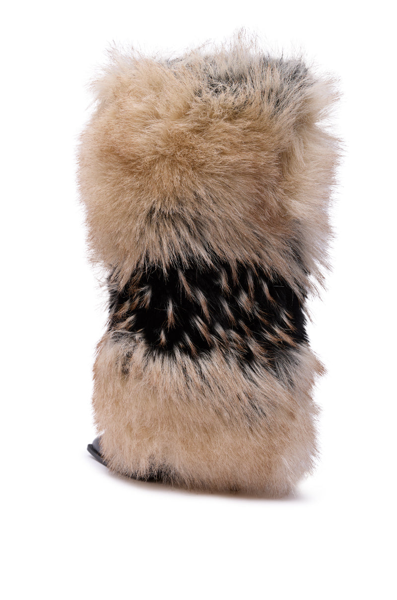 The AZALEA WANG EKKO MULTI FUR STILETTO BOOT features fluffy faux fur in light tan, cream, and black, a layered textured design, and a rounded top, shown against a white background.