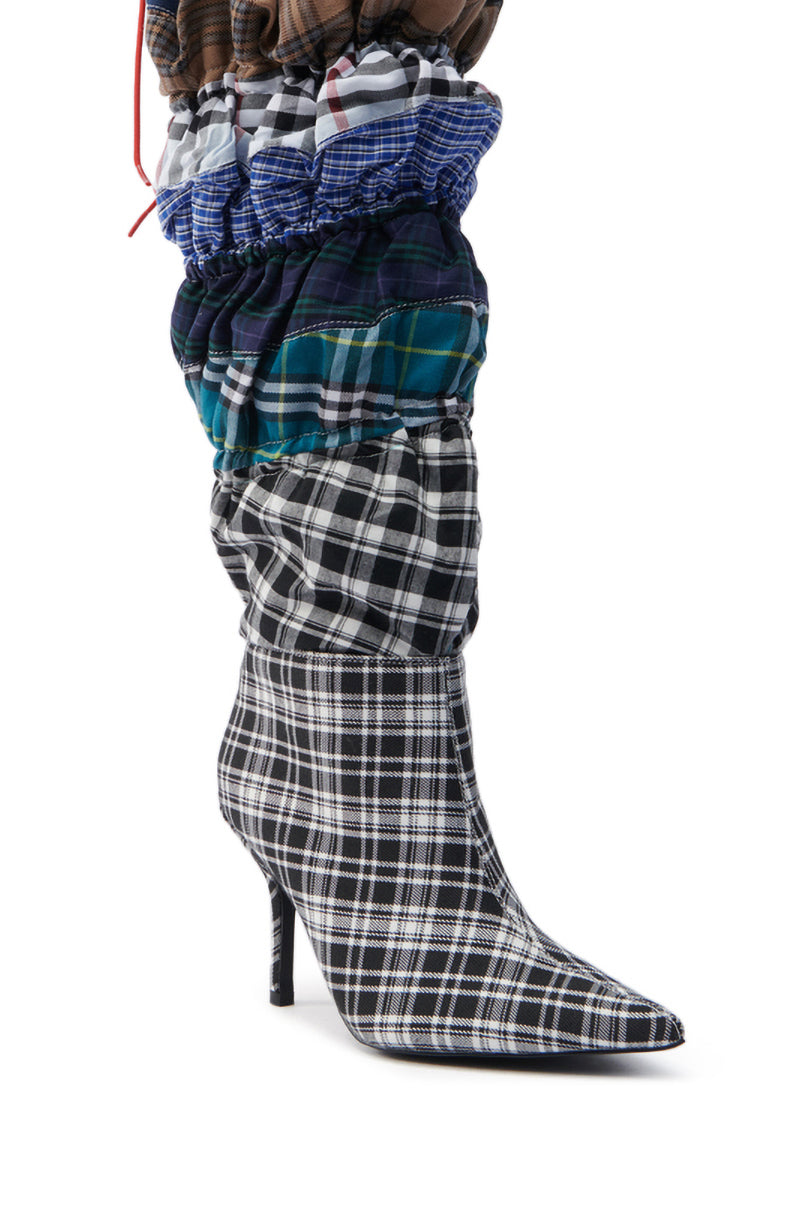 Introducing the AZALEA WANG ELODIE MULTI BOXER BOOT: a fashion-forward, knee-high boot with a stiletto heel and layers of gathered plaid fabric in black, white, blue, and green. Its pointed toe design makes it the perfect choice for any trendsetter seeking style and sophistication.