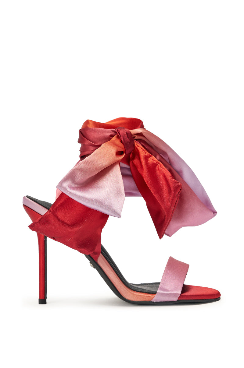 The AZALEA WANG ELZON ORANGE SATIN STRAPPY SANDAL features a thin red stiletto heel, a pink front strap, and a wide ombre satin ankle wrap with a bow—perfect evening party shoes blending pink, red, and peach tones. 5