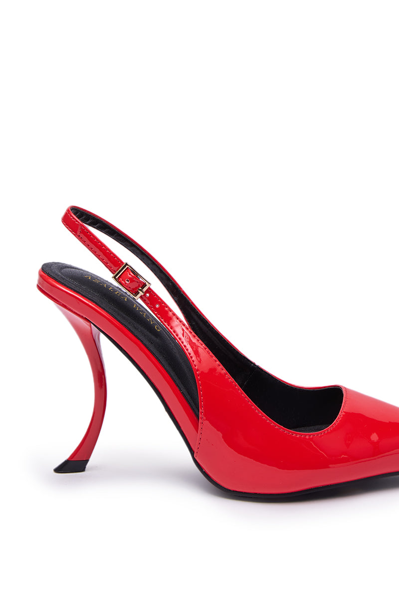 The AZALEA WANG EMANUELA RED SHARP TOE SLING BACK PUMP features shiny red faux patent leather, a pointed toe, stiletto heel, black insole, and a unique curved design, displayed against a white background.
