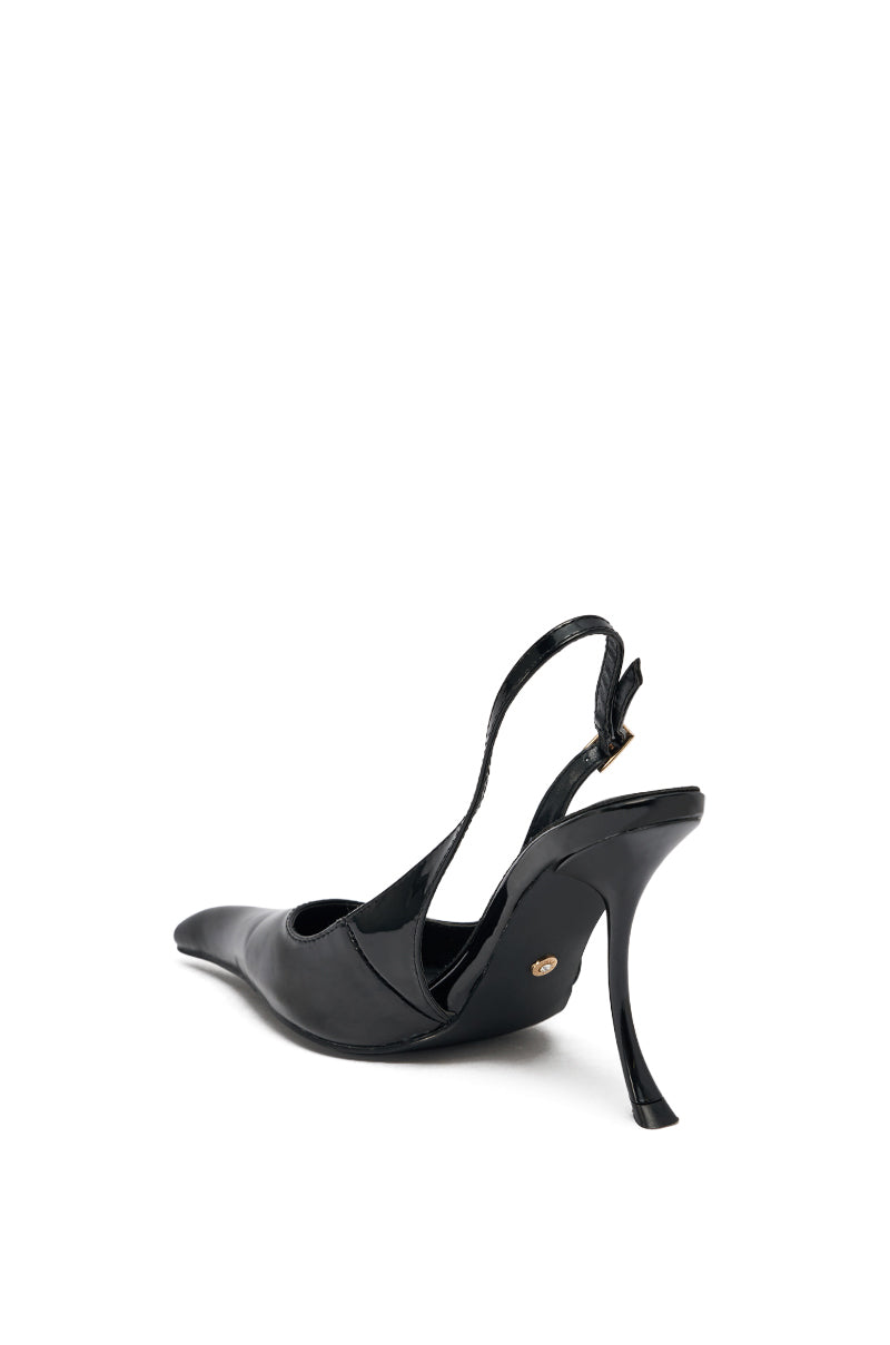 The AZALEA WANG EMANUELA BLACK NOVELTY SLING BACK PUMP is shown on a white background, angled to highlight its pointed toe, sling back, and gold emblem near the stiletto heel. 5