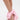 A person wears the AZALEA WANG EMEKA Pink Platform Sandal with Bow, featuring large matching ankle bows, a stylish wedge heel, and faux leather construction, standing on a white background.