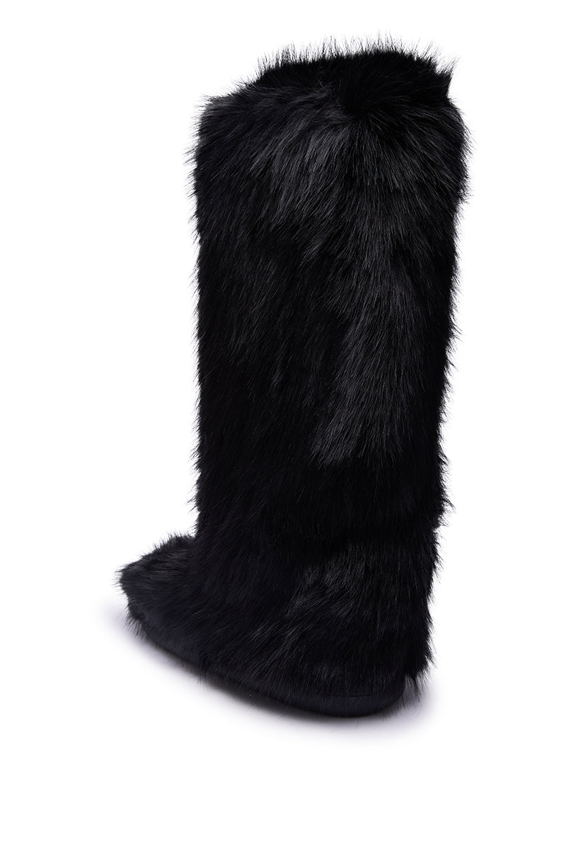 The AZALEA WANG EMIR BLACK FLAT FUR KNEE HIGH BOOT is a tall, knee-high boot fully covered in soft, shiny black faux fur with a flat sole, displayed at an angle on a white background.