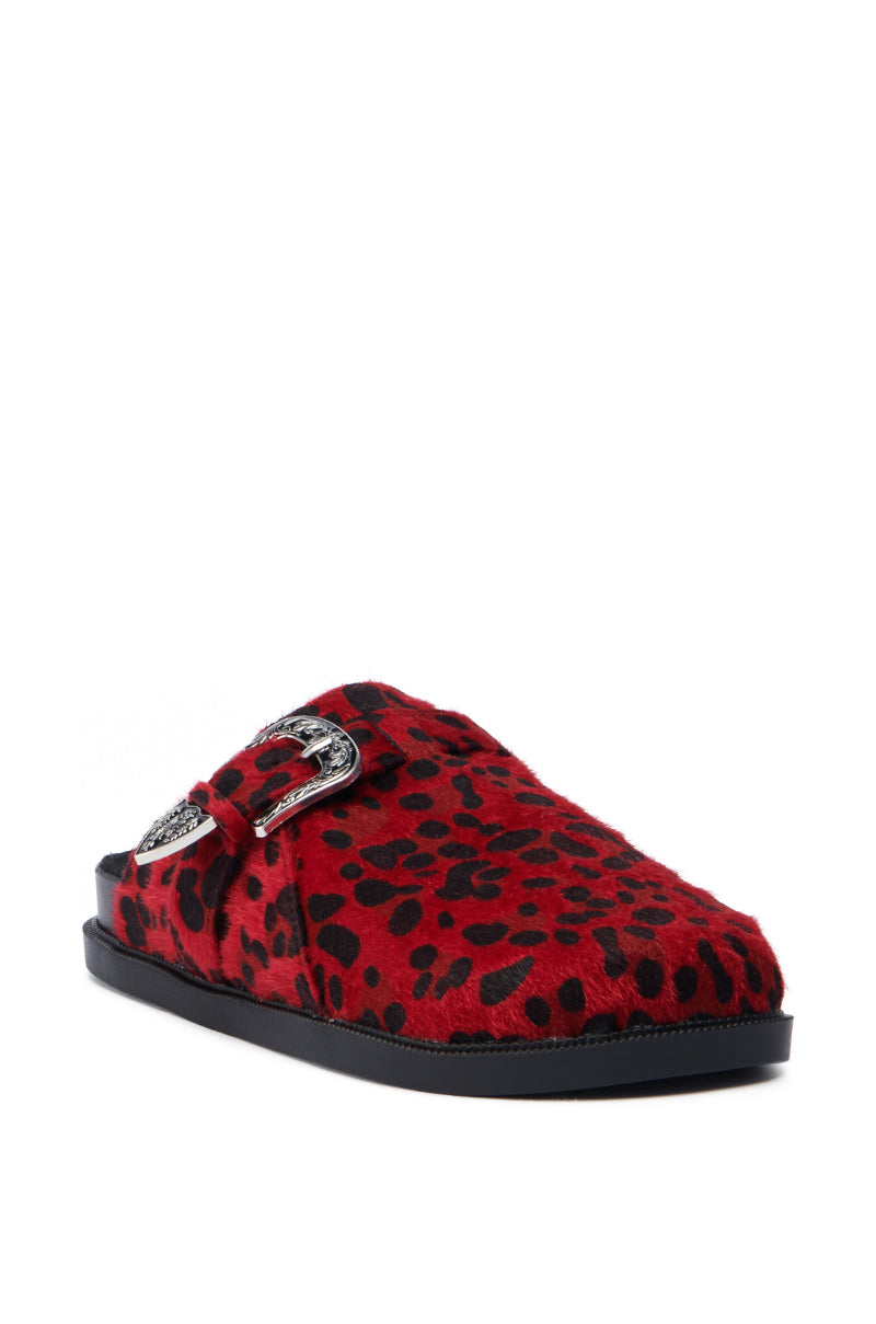 Introducing the AZALEA WANG ENDGAME RED LEOPARD slipper: a masterpiece in red leopard design with black spots on luxurious faux pony hair, complemented by a black sole and a decorative silver buckle on the side.