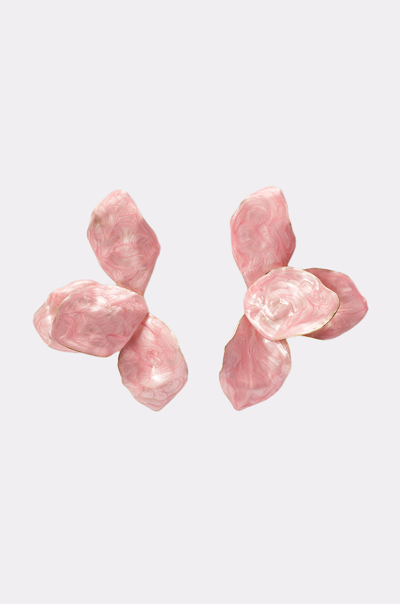 The PRETTY IN PINK EARRING features two pink floral enamel earrings with a marbled, iridescent finish and abstract petal shapes—a perfect vacation jewelry accent, arranged symmetrically on a simple light background. 1