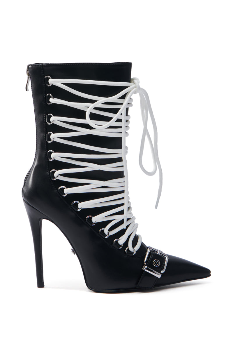 The AZALEA WANG ERYX BLACK LACE UP STILETTO BOOTIE is a chic faux leather high-heeled bootie with a pointed toe, white crisscross laces, a decorative buckle near the toe, and a back zipper for easy wear.