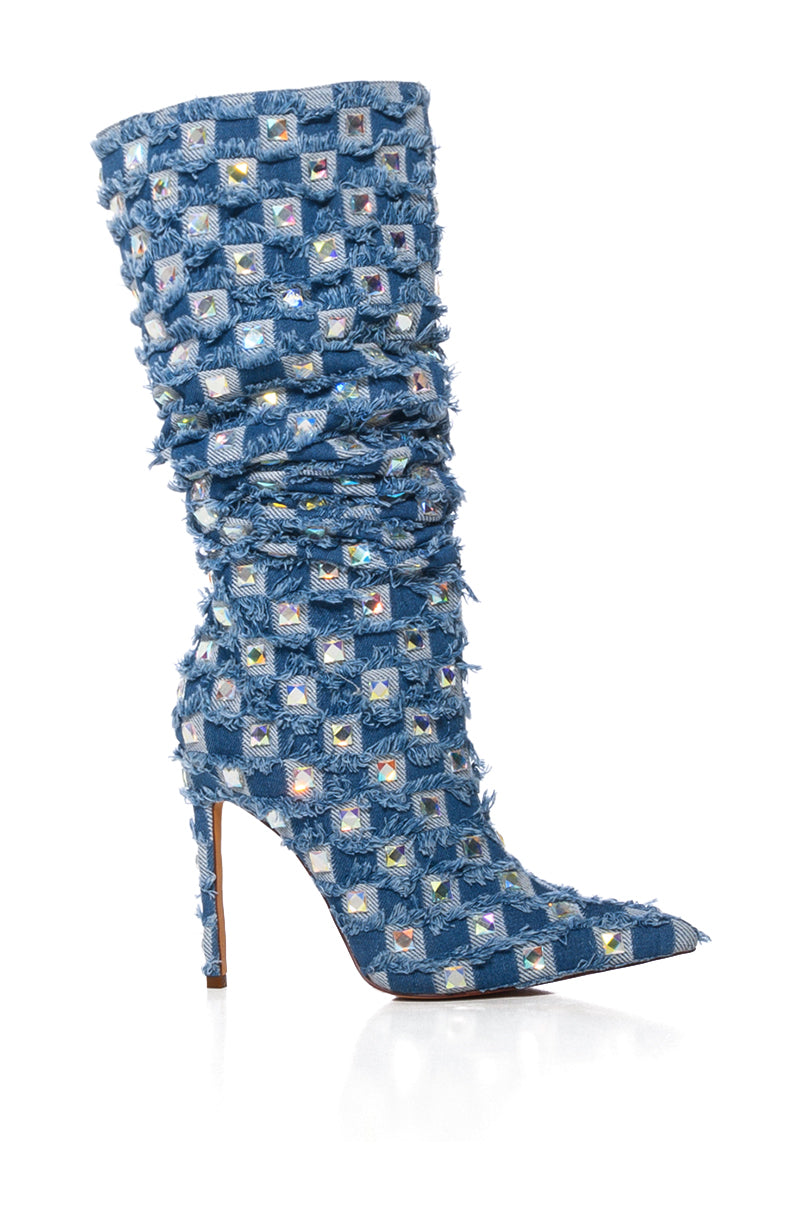 The AZALEA WANG EVE Denim Knee-High Embellished Boot, featuring textured blue fabric with mirrored squares, a pointed toe, and slim stiletto heel, dazzles with rhinestone accents for a statement look. 3