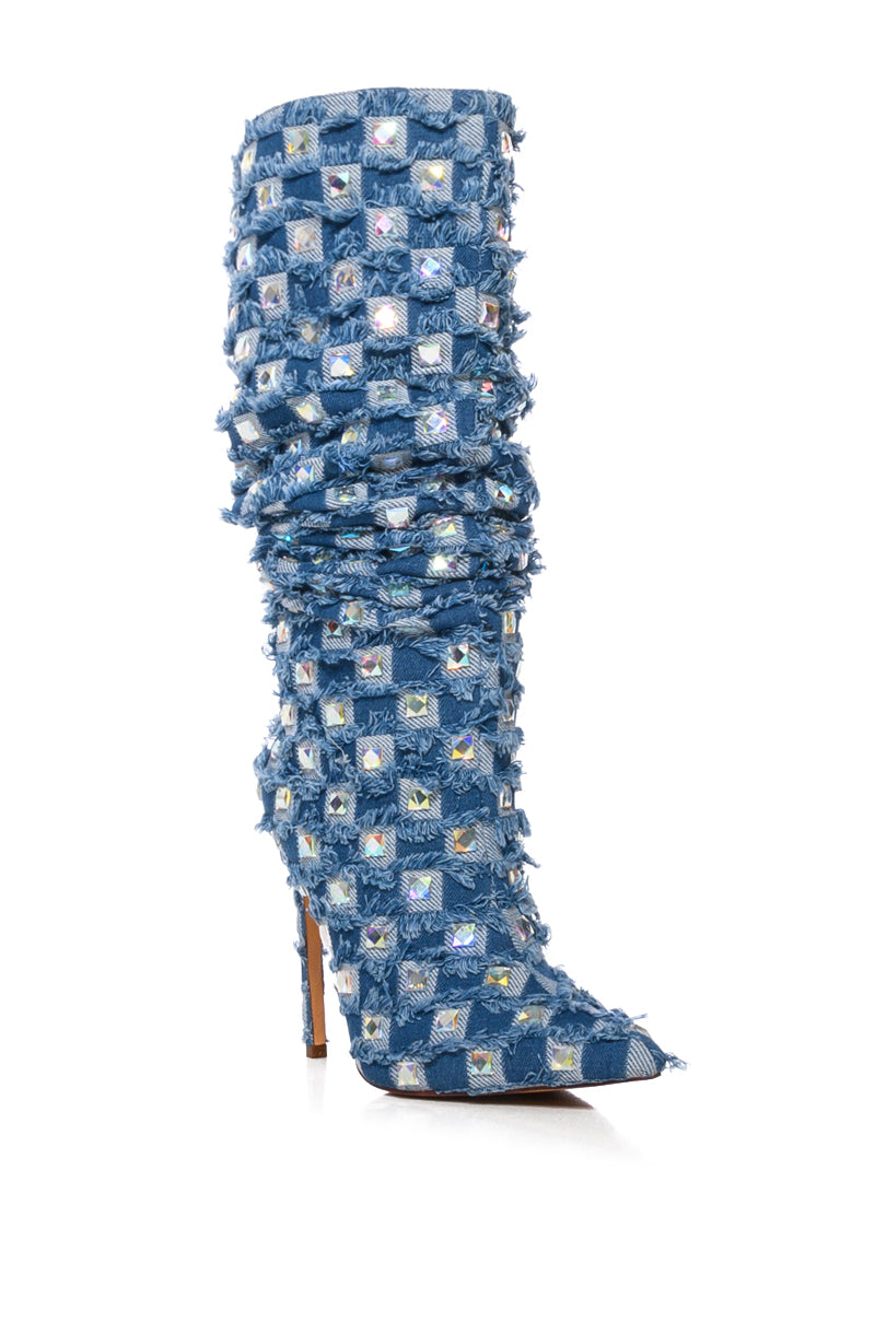 The AZALEA WANG EVE Denim Knee High Embellished Boot has a pointed toe, stiletto heel, and is adorned with rhinestone square crystal studs for a sparkling, textured look. 5