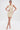 A woman poses in the FEELIN SWEET KNIT SWEATER DRESS WITH PEARLS, a curve-hugging mini with textured knit and pearl accents, styled with white open-toe heels against a plain white background.