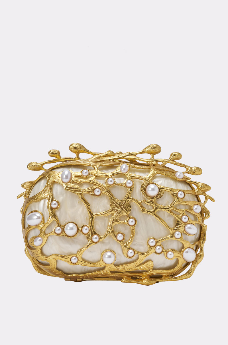Introducing the ALWAYS OUTSIDE CLUTCH—a small, elegant evening bag featuring a creamy white base with an intricate gold branch design and pearl accents. Ideal as a bridal clutch for special occasions.