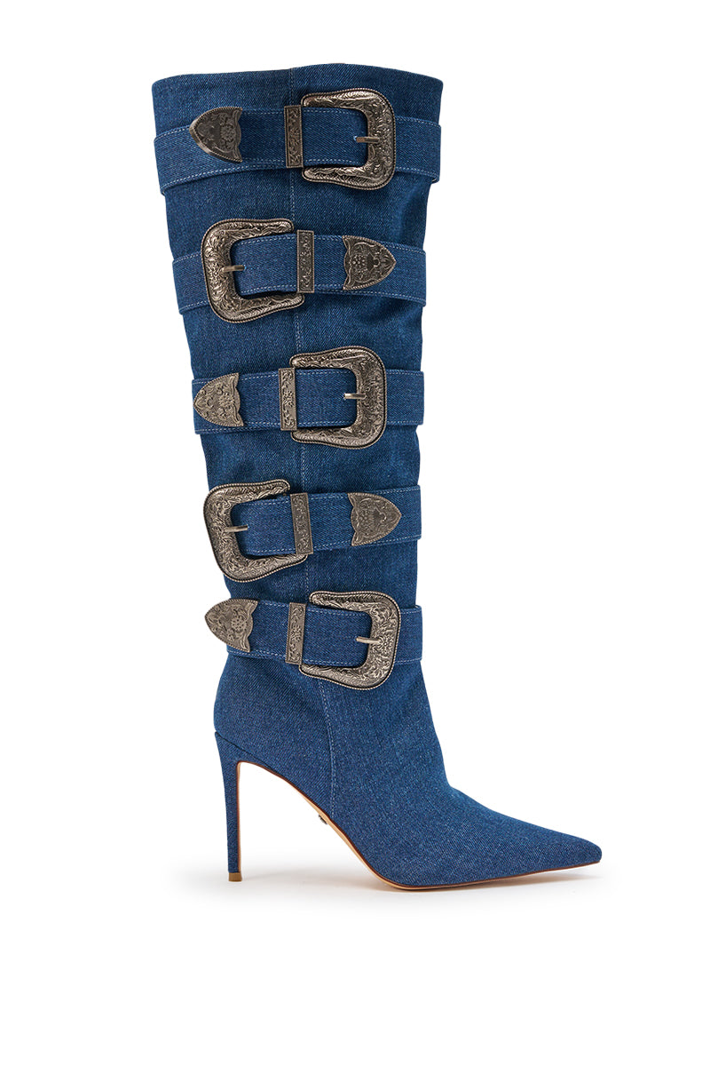 The AKIRA GOLD FALLON DENIM BUCKLE EMBELLISHED STILETO BOOT is a knee-high, pointed-toe denim stiletto with five bold silver buckles and straps—perfect for adding standout cowgirl-inspired flair to any look. 4
