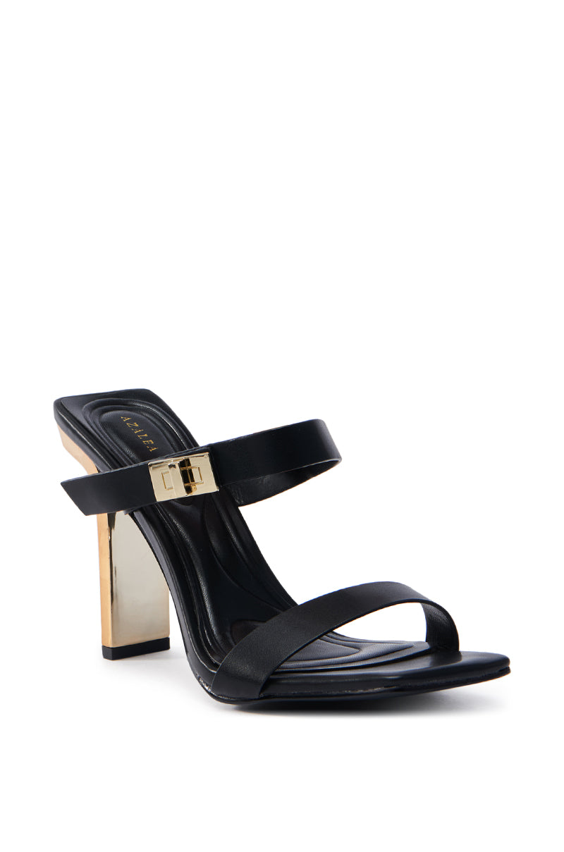 The AZALEA WANG FANAKA BLACK CHUNKY SANDAL features stylish faux leather with two straps and a gold accent on the upper strap, an open square toe, and a reflective gold block heel for a chic look.