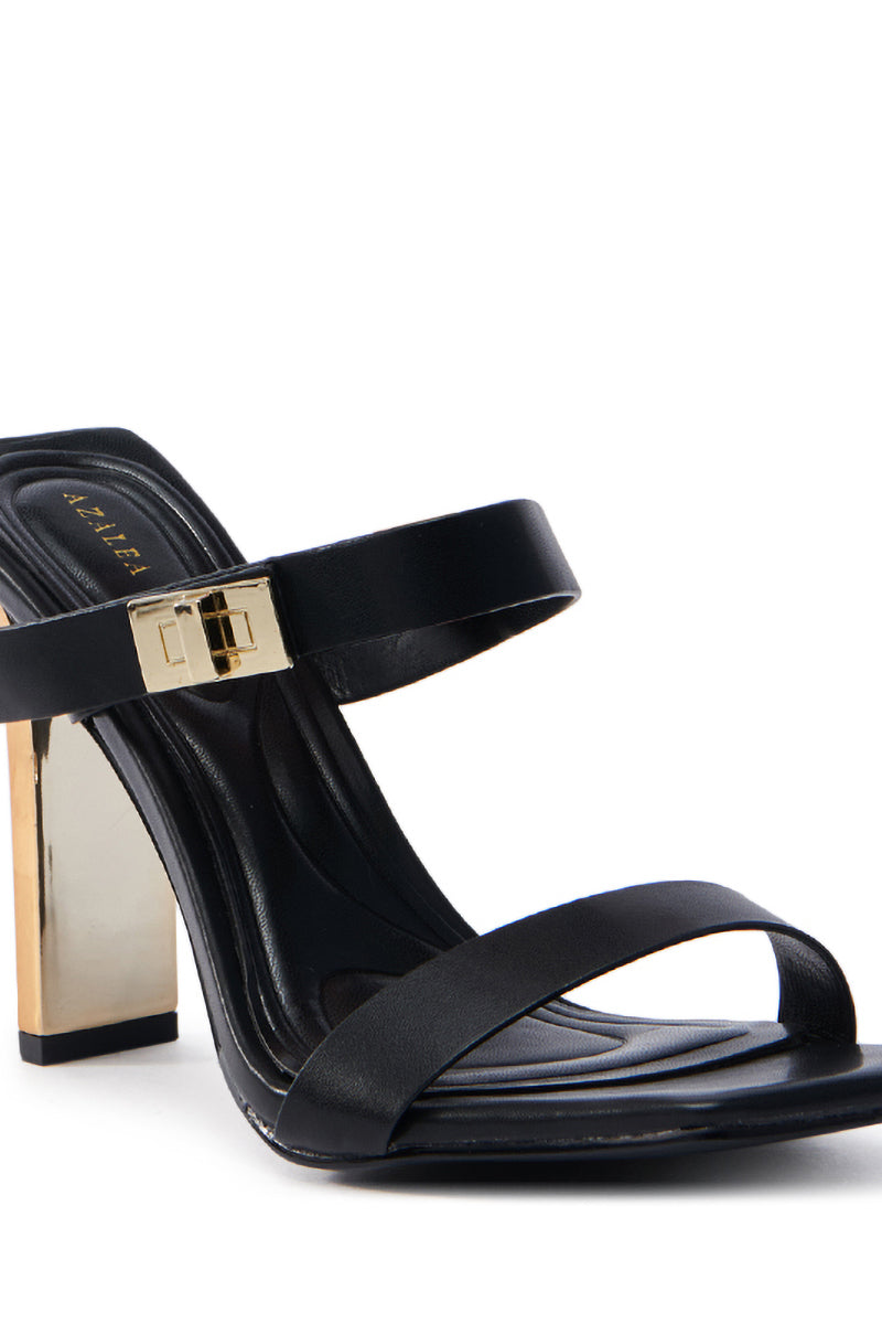 Experience the elegance of the AZALEA WANG FANAKA BLACK CHUNKY SANDAL. It features an open square toe, two faux leather straps with a gold buckle detail, a gold block heel, and a cushioned sole for comfort.