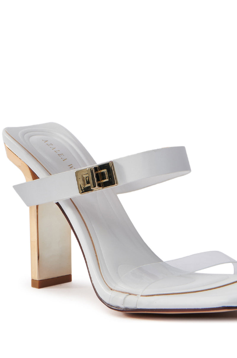The AZALEA WANG FANAKA White Chunky Sandal features a stylish vegan leather construction with a white strap and gold buckle, an open square toe with a clear strap, and a light-colored block heel.