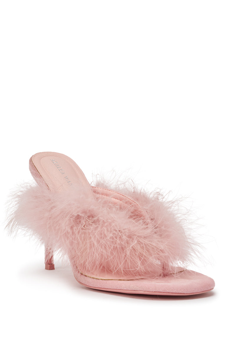The AKIRA FEMINISTA PINK FAUX SUEDE FUR EMBELLISHED KITTEN HEEL SANDAL features a pink faux suede finish and fluffy fur trim for a luxe look. 5