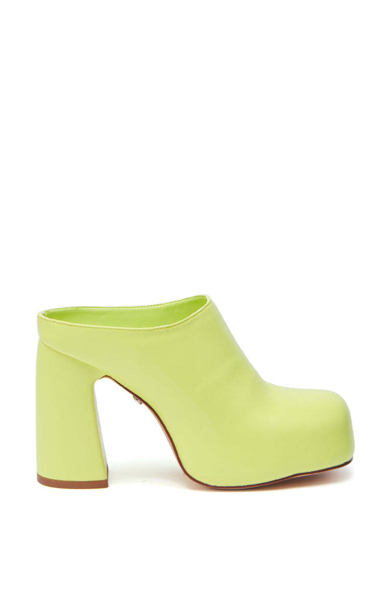 The AZALEA WANG FLOREA LIME CLOG STYLE PUMP is a single lime green faux leather mule with a chunky heel and closed toe, shown in a side view against a white background.