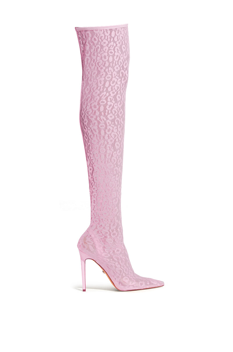 The AZALEA WANG FREYJA OVER THE KNEE LACE BOOT IN PINK is a single light pink, thigh-high boot featuring a pointed toe, subtle leopard print texture, and an elegant slim stiletto heel.