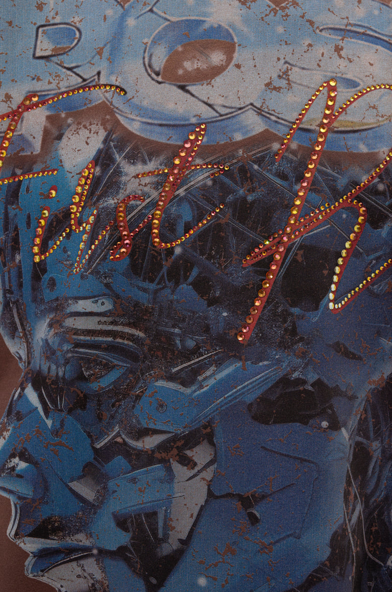 Close-up of a textured artwork featuring a blue robotic face with metallic details, orange cursive text, and shiny beads—ideal for the POST HUMAN OVERSIZED GRAPHIC TEE or any bold cyberpunk streetwear look. 6