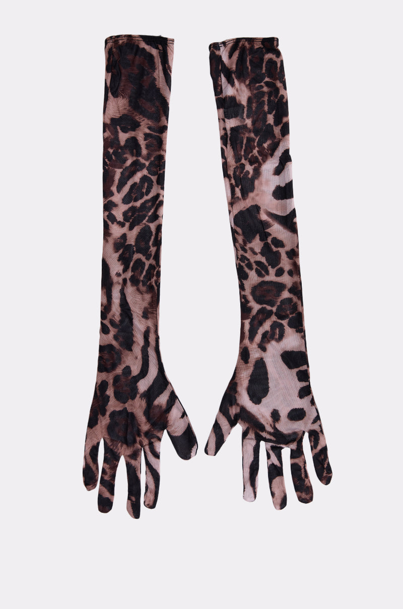 A pair of REALLY WITH IT CHEETAH GLOVES, upper-arm length with a brown and black leopard print pattern, are laid flat on a light background.