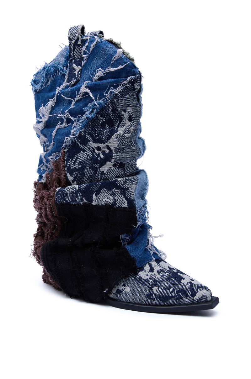 The AZALEA WANG Gabryle Multi Material Western Bootie features a tall silhouette, chunky heel, pointed toe, and a deconstructed design with layered, frayed denim and fabric patches in blue, black, and brown.