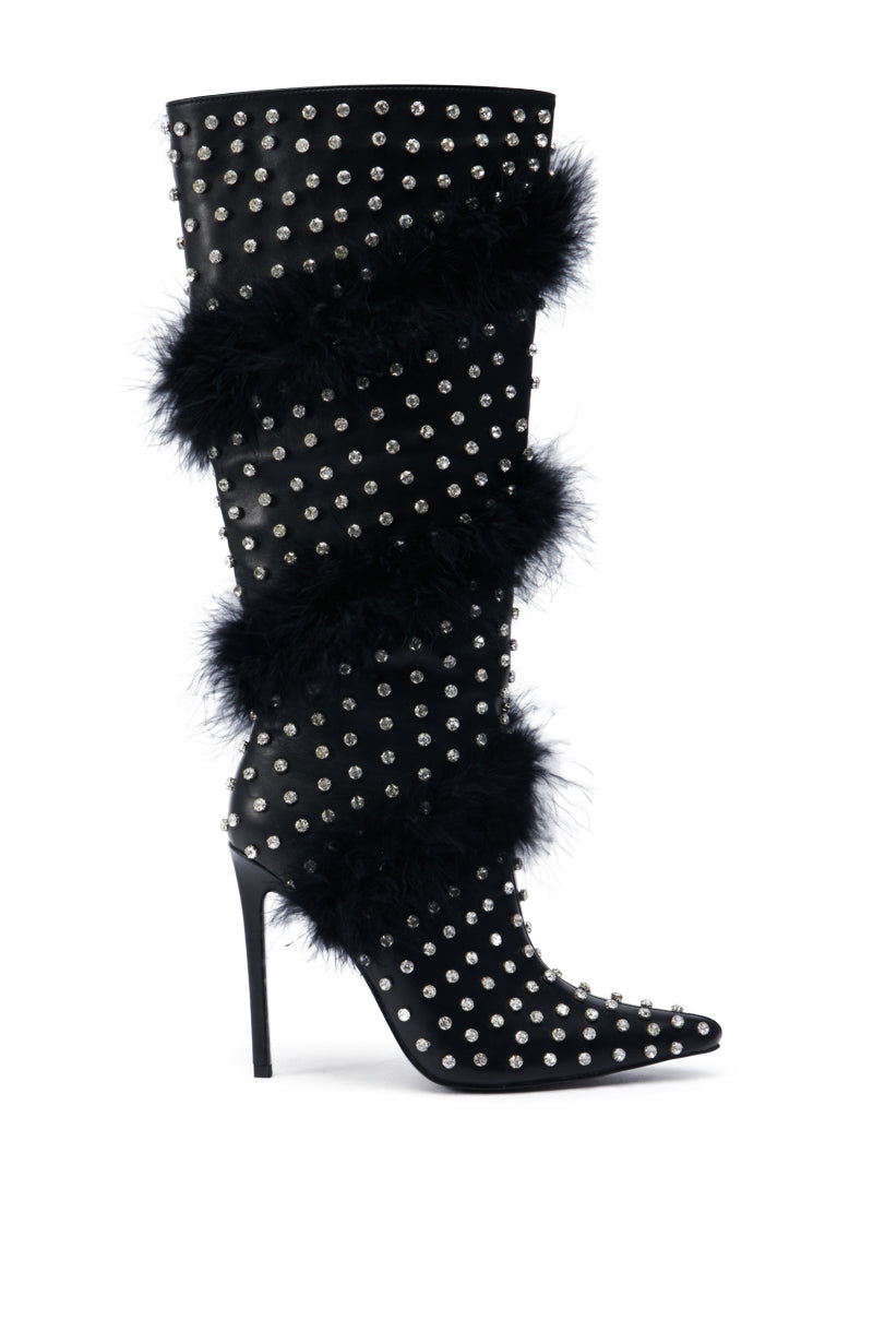 Introducing the AZALEA WANG GARDENIA FEATHER EMBELLISHED BOOT IN BLACK, a stunning knee-high boot crafted from black faux leather, enhanced with silver studs and layers of feather embellishments, complete with a sleek stiletto heel and pointed toe design.