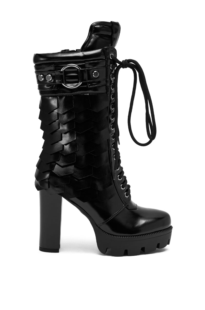 The AZALEA WANG GERNOT Black Lace Up Scaled Platform Bootie features a chunky sole, textured side panels, metal buckle detail, and long laces—ideal for those who love bold, statement lace-up boots.