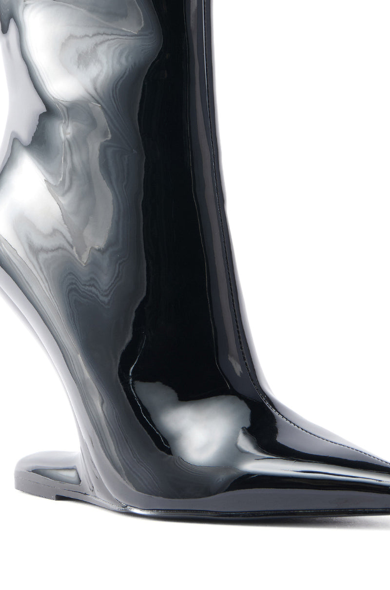 The AZALEA WANG GLACIELLE PATENT BLACK WEDGE BOOTIE features a pointed toe and an inverted wedge heel with glossy, reflective surfaces, set against a plain white background.