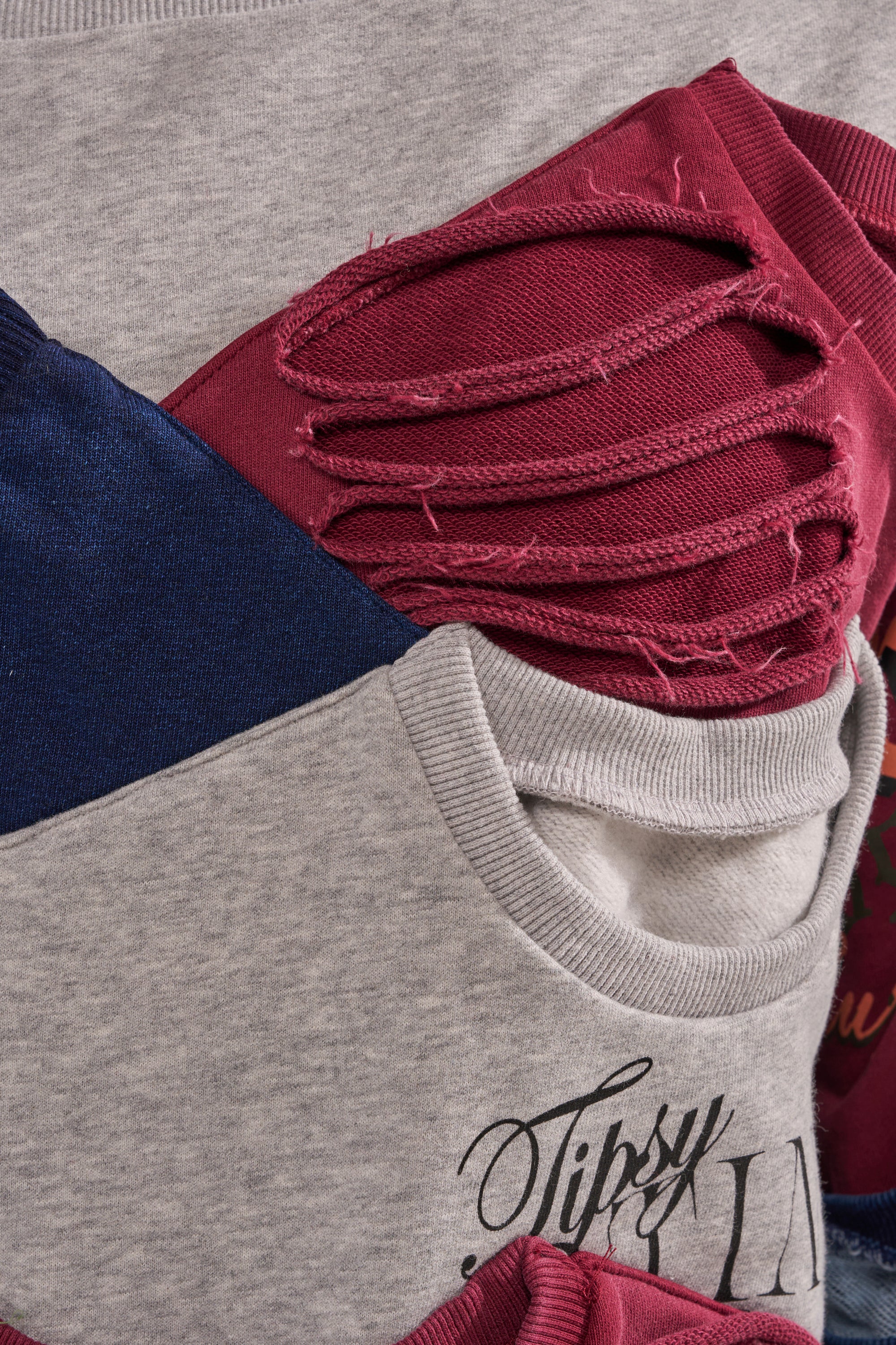 A close-up of the TALK LATER OFF THE SHOULDER PATCHWORK DRESS shows gray, navy, and maroon panels. The maroon section has frayed horizontal slits, while "Tipsy" is partly visible on the gray fabric. 6