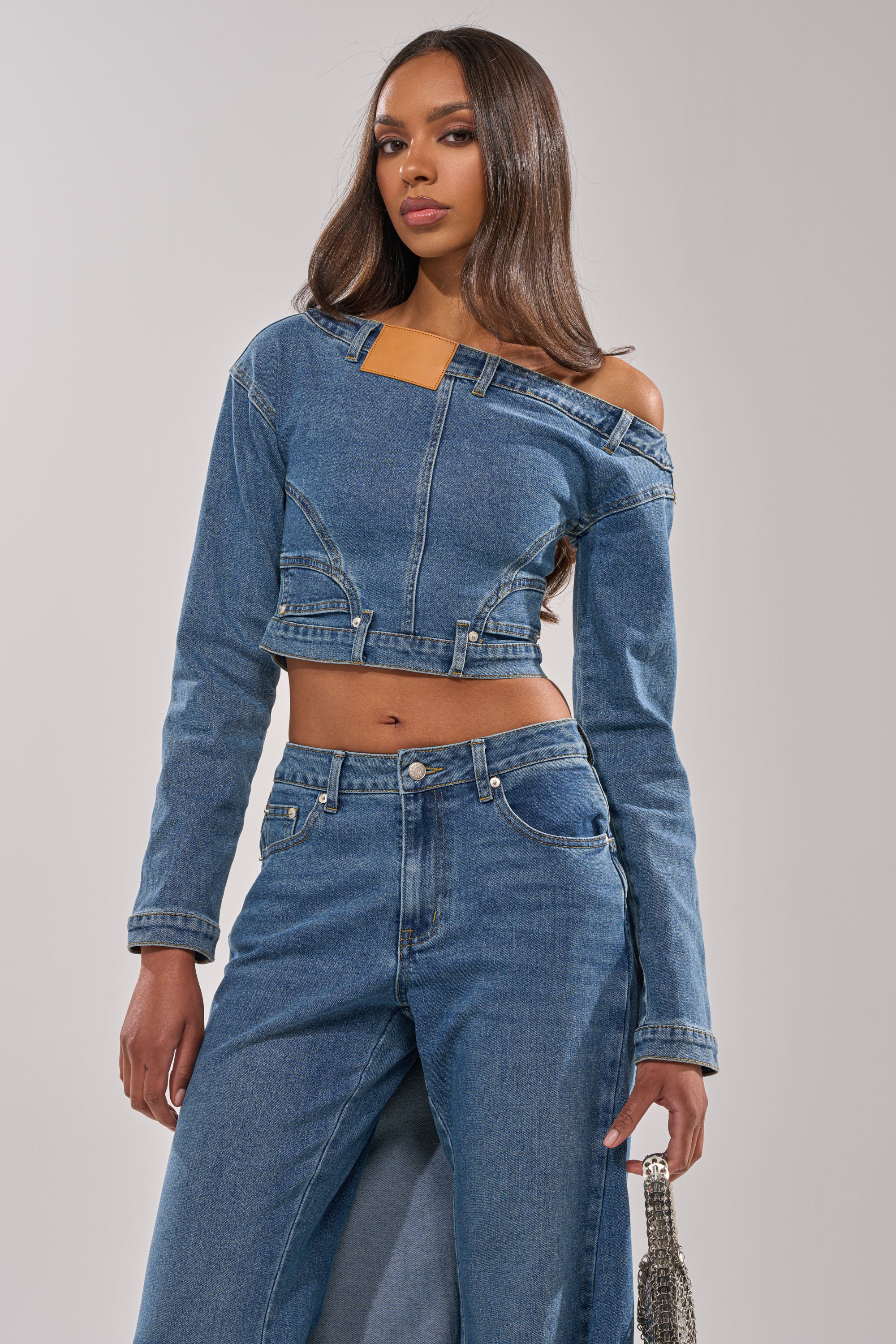 SHAKE IT OFF DENIM OFF THE SHOULDER TOP – AKIRA