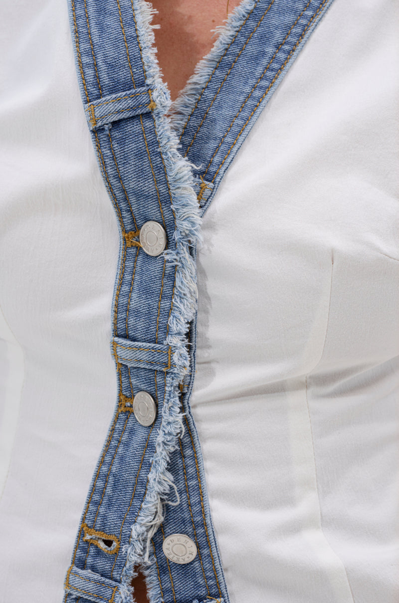 Get a closer look at the DENIM BABY BUTTON DOWN TOP: a crisp white shirt featuring a vertical blue frayed denim strip, bold yellow stitching, and silver buttons—perfect for street style and summer wear. 8
