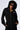 Person wearing the TAKE THE LONG WAY OVERSIZED ZIP UP HOODIE from the AKIRA Label, a black oversized zip-up made with a slight stretch cotton fabric and the hood up, paired with black sunglasses. Holding the pockets of their hoodie, which features a small white design on the left chest area. Curly hair against a plain white background.